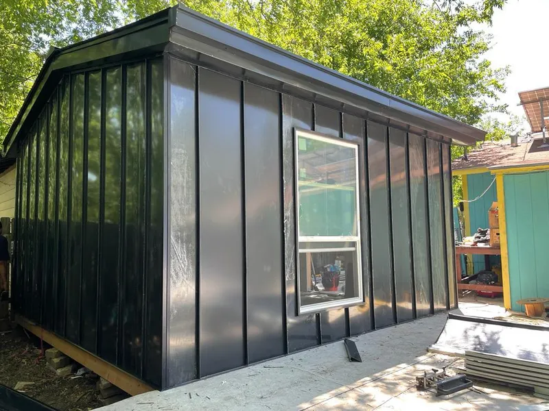 Black standing seam metal wall panels for Roof Inspection in Beardstown