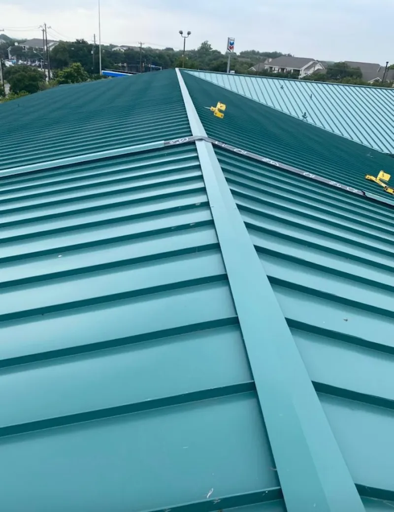 Green commercial metal roof ridge and valley for Metal Roof Repair in Beardstown